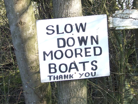 Please go past moored boats slowly
